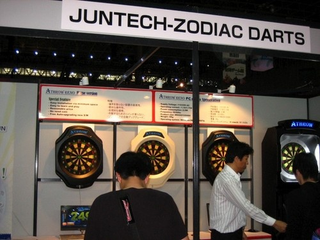 Illustration for article titled Booth Check: Q-Games, Nyko, Acquire, Jun-Tech Zodiac Darts